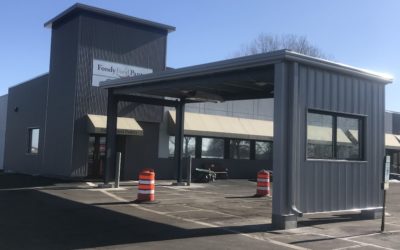 New Canopy Helps Volunteer Staff Brave Inclement Weather